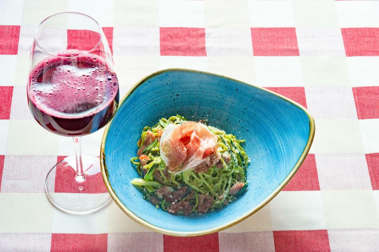 Grand Hotel Salsomaggiore Salsomaggiore Terme Exterior photo A glass of Lambrusco paired with a salad